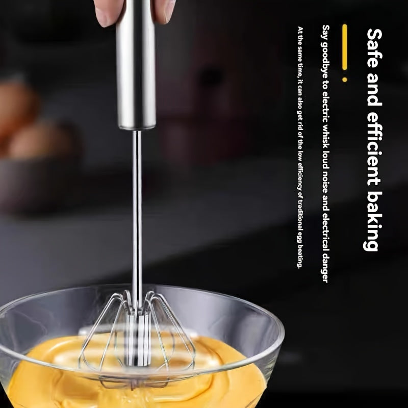 Hand-held stainless steel manual egg beater for baking and cooking, no battery needed.