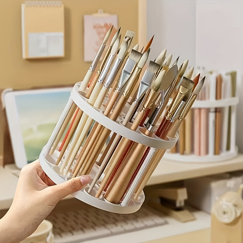 White plastic organizer with glaze finish, rotating brush holder for art brushes, pens, and makeup tools, multi-compartment desk accessory.