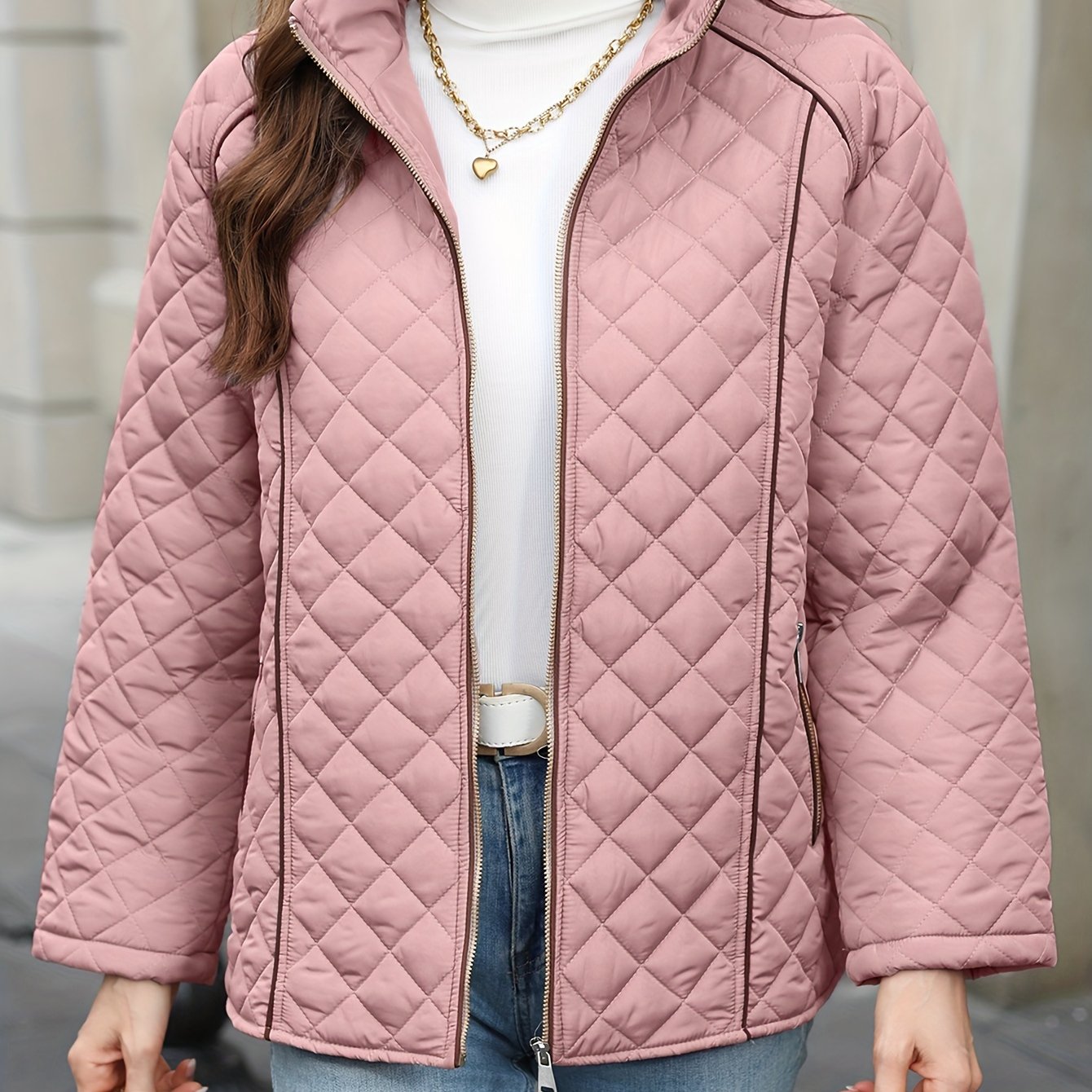 Women's plus size casual quilted outerwear with stand collar, zipper, and long sleeves. Made of 100% non-stretch solid woven polyester for fall/winter.