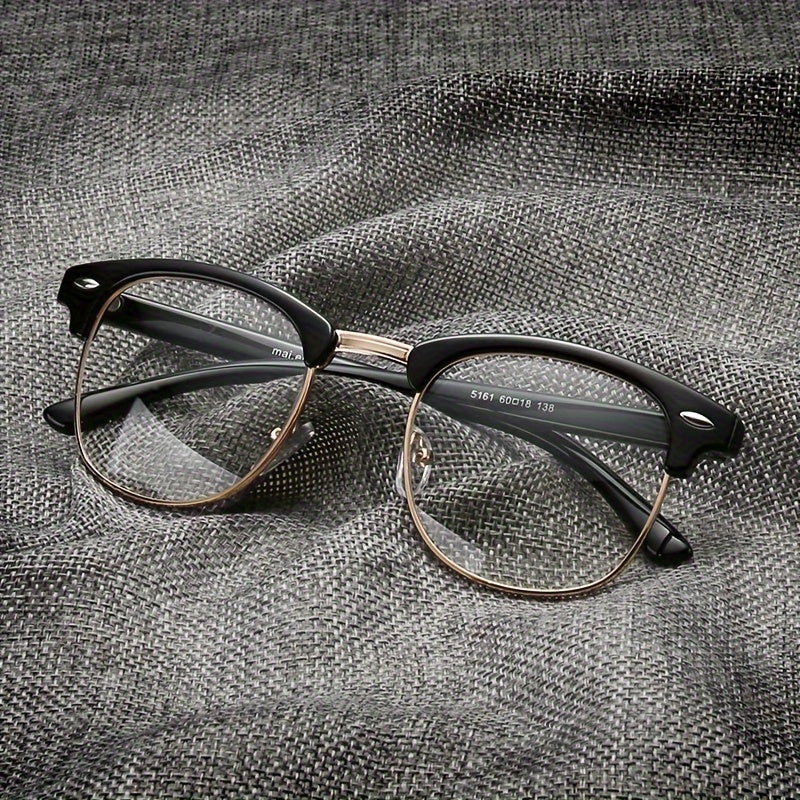 Chic black eyeglass frame for women with retro golden anti-blue light feature, clear transparent lenses, and eyebrow-shaped design, also suitable for men's computer glasses.