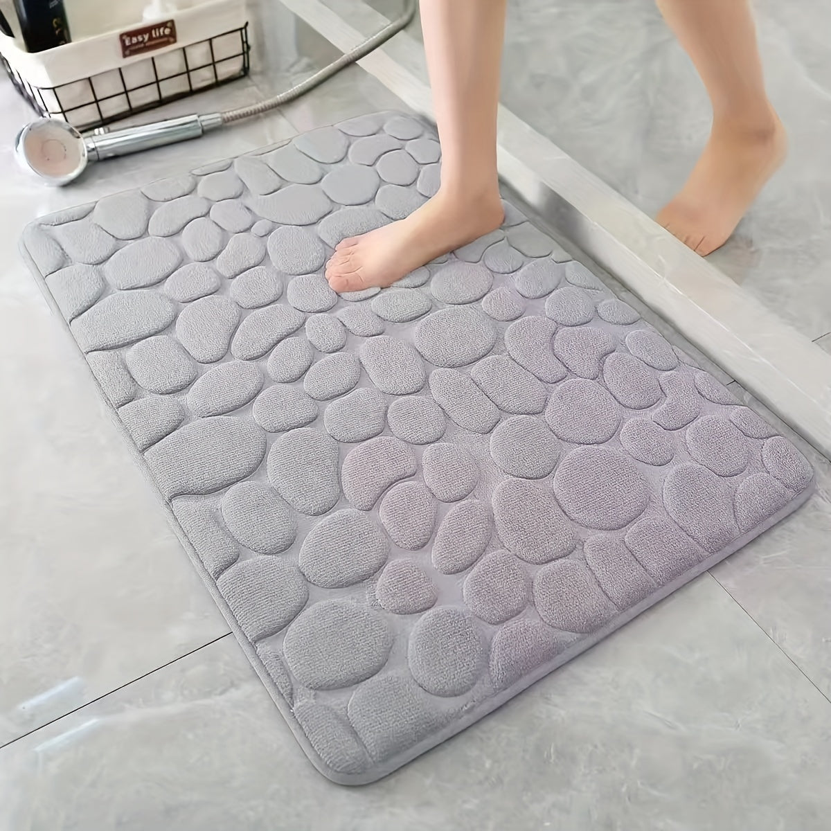 Memory Foam Pebble Bathroom Mat, 1-piece 
- Made of 700gsm Woven Polyester 
- Non-Slip and Absorbent Bath Rug 
- Can also be used as a Door Mat, Bedroom Carpet 
- Features a 1.5cm Thick Backing 
- Provides a Comfortable Bath Floor Experience