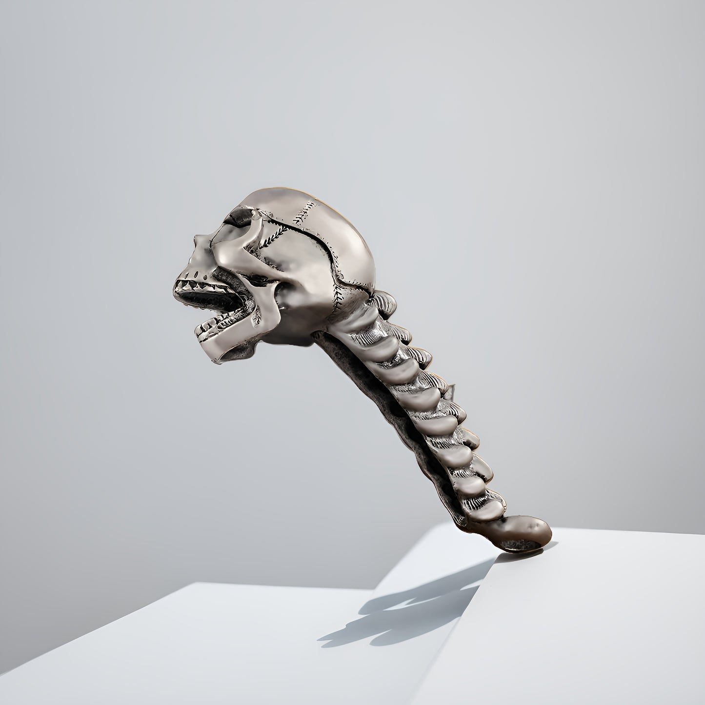 Skull-shaped metal bottle opener for beer and juice, perfect for home and restaurant use.