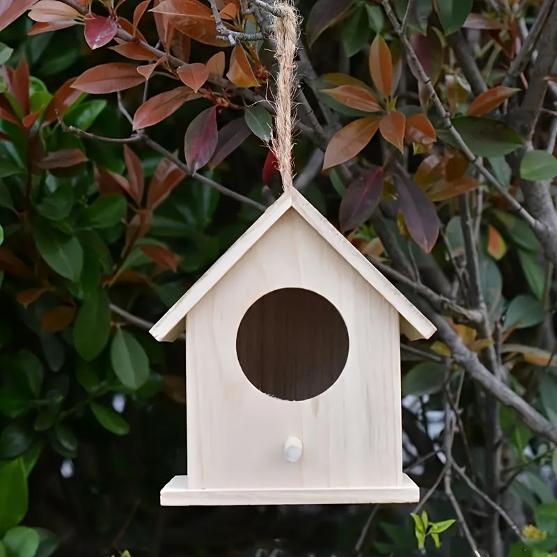 Mini hanging bird feeder made of handcrafted wood, with perch and natural finish, perfect for attracting hummingbirds and small birds in the garden.