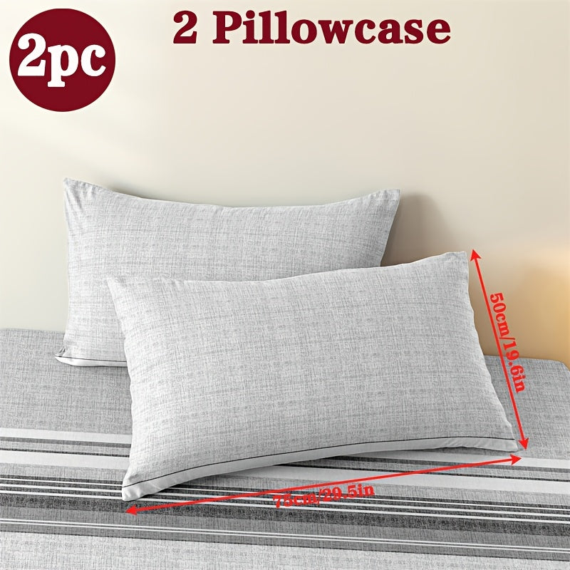 Two geometric print pillowcases made from soft and breathable polyester microfiber. These pillowcases are machine washable and feature an envelope closure for easy use. Perfect for adding a stylish touch to your home bedding, these pillowcases do not