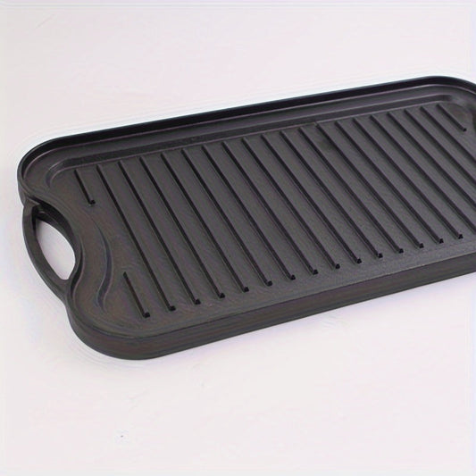 Rectangular cast iron skillet with reversible roasting pan and deep roasting grill, suitable for multiple cooking purposes. This non-stick camping cookware comes in black color.