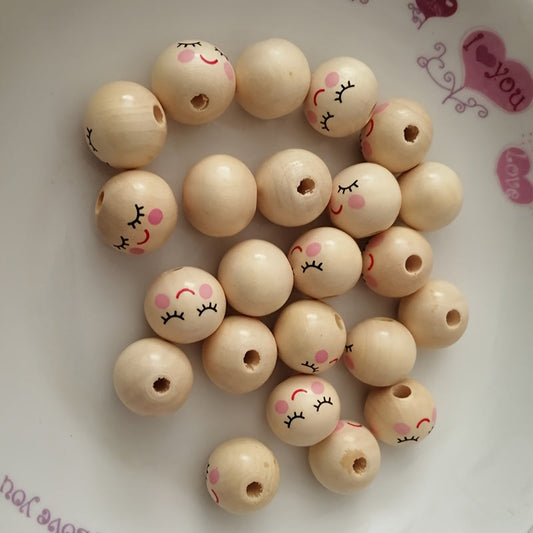 Fifty pieces of 14MM Wooden Hole Beads, Ball Spacer Beads with Holes, Cute Smiling Doll Head Beads for DIY Jewelry Making, Perfect for Eyelash Girls Face Designs.