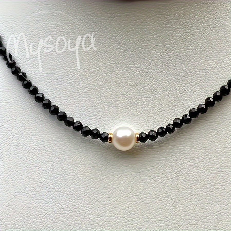 This exquisite Black Onyx and Freshwater Pearl Necklace is lovingly handcrafted and is the ideal gift for anyone. Whether it's for her or him, this timeless piece is perfect for daily wear or special occasions like weddings. The Black Onyx gemstone is