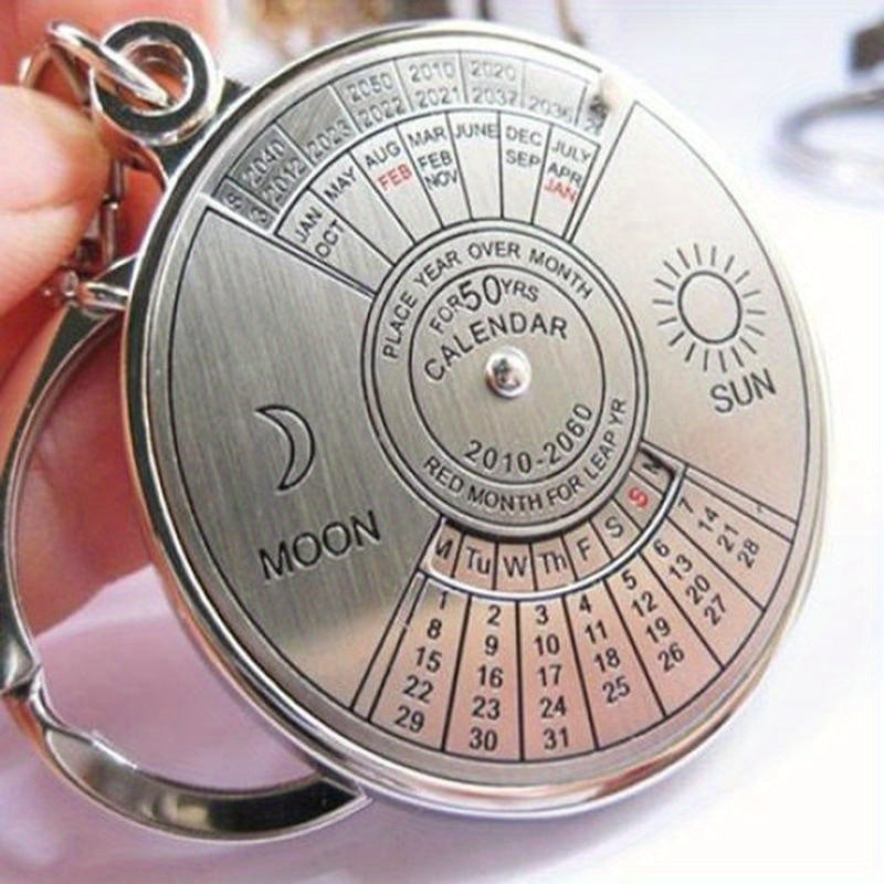 Perpetual calendar keychain with rotating compass. Unique gift for car keys.