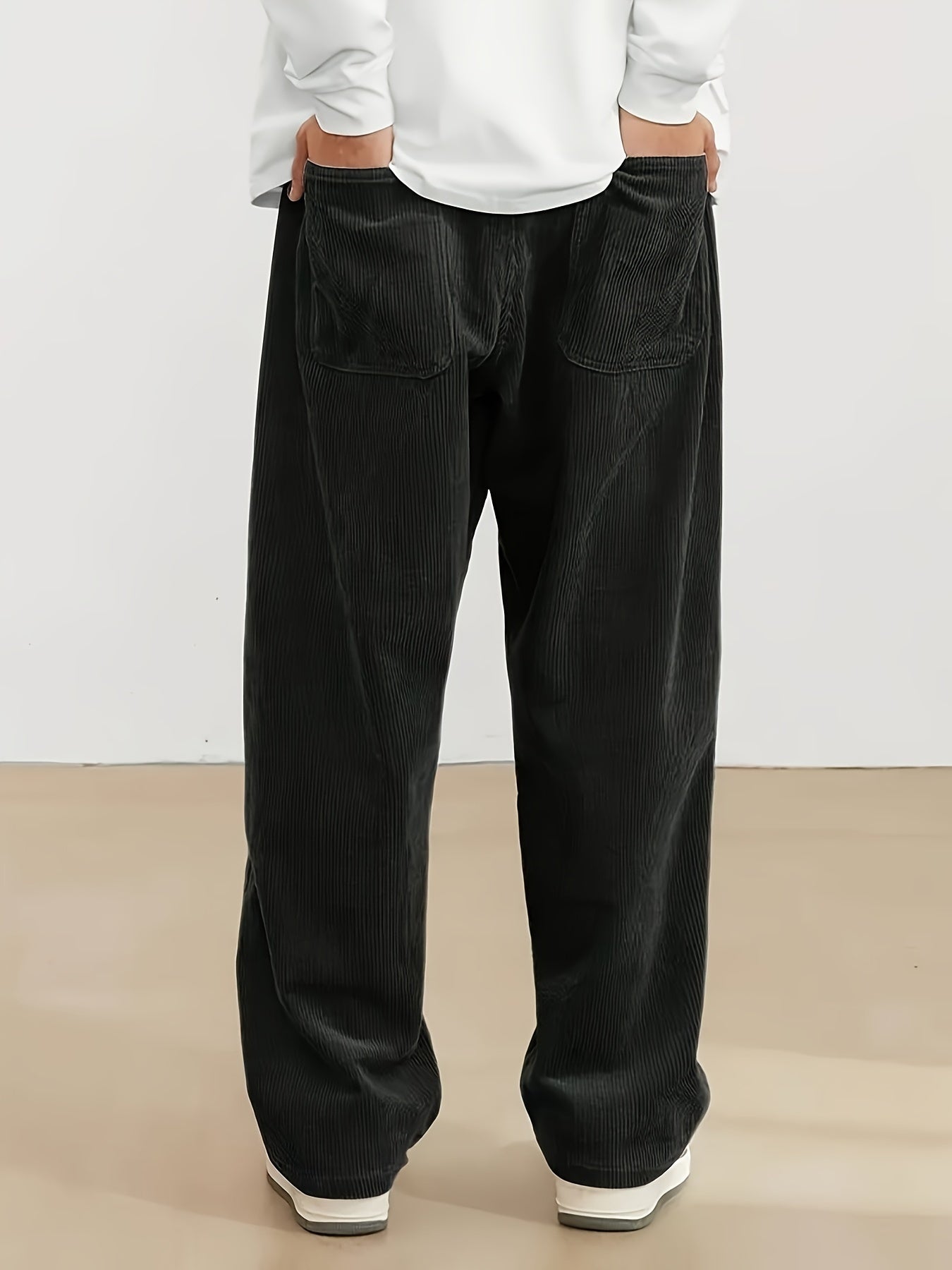 Men's plus size corduroy pants with pocket detail for fall/winter, featuring a letters print.