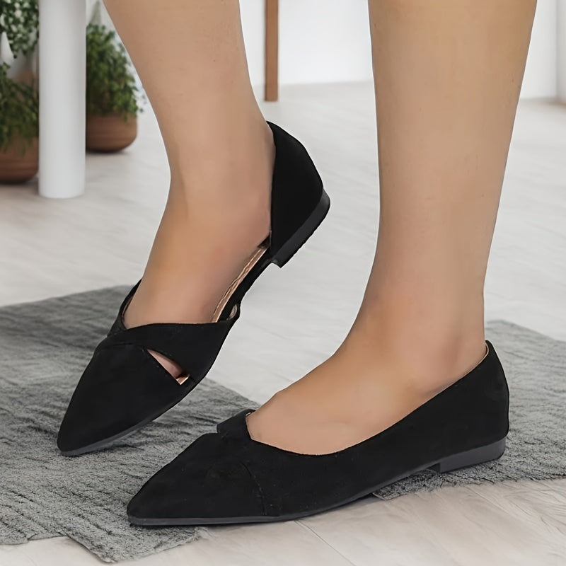 Elegant pointed toe slip-on flat shoes with side cut-out detail, suitable for all-day wear.