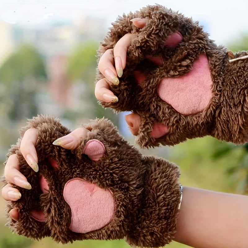 Stylish and cozy, these Cute Cat Claw Plush Gloves provide warmth and comfort in the cold seasons. The half finger design adds a trendy touch to these thick, fuzzy gloves, making them perfect for autumn and winter.