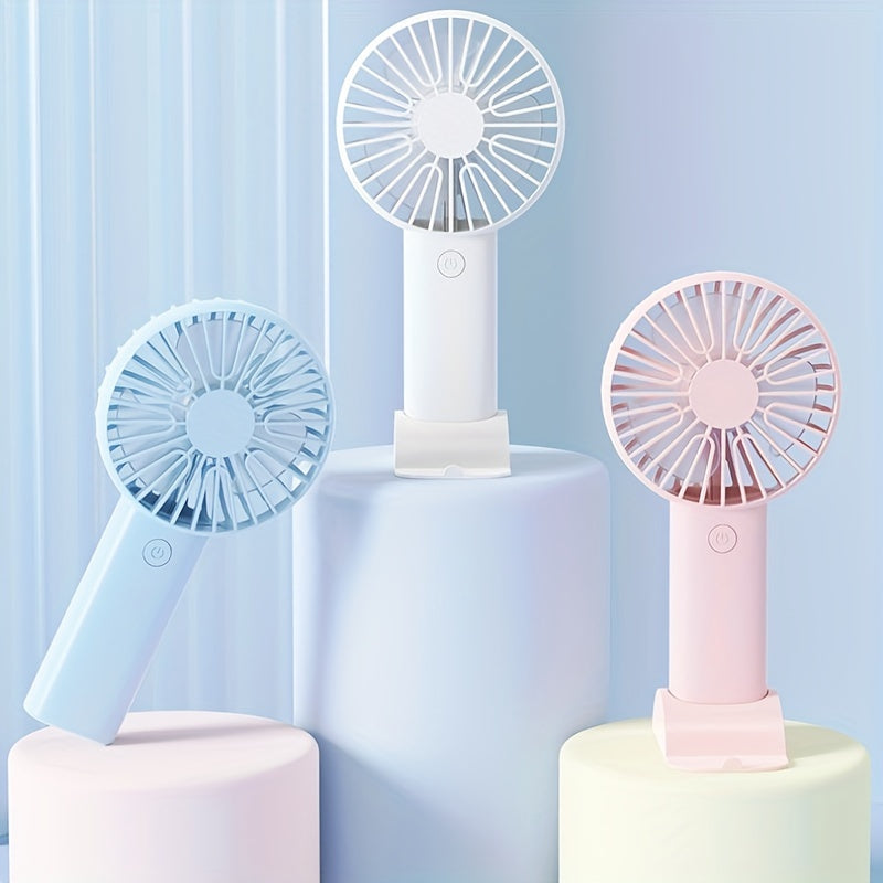 Portable USB Mini Fan in White, Blue, and Pink with Touch Control - Perfect for Office, Travel, Camping, and Picnics. Wearable design makes it convenient to carry around. Rechargeable with Built-in Lithium Battery for on-the-go cooling. Get the Mini Fan