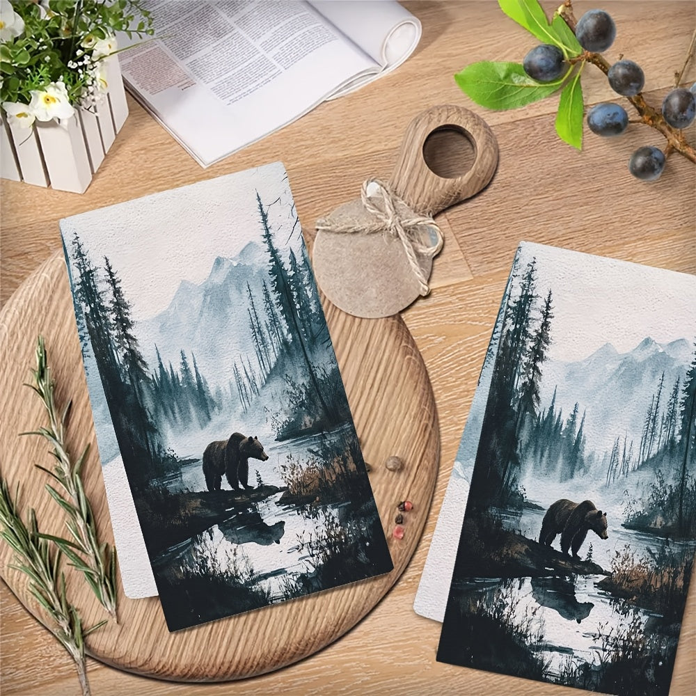 Set of 2 luxurious kitchen towels featuring a majestic grizzly bear in a wilderness scene. These ultra soft towels are highly absorbent, machine washable, and designed in a contemporary style. Each towel measures 40.64x60.96 cm.