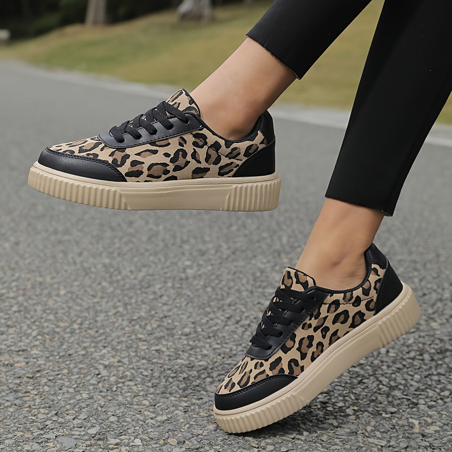 Comfortable flat casual shoes with leopard print for women, suitable for outdoor activities all year round. Made with fabric lining and insole, MD sole, lace-up closure, and regular toe