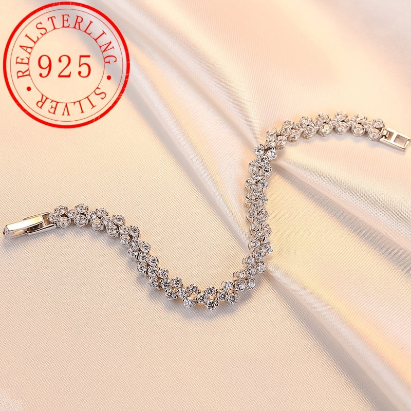 This elegant tennis bracelet is made of high-quality 925 sterling silver and features synthetic Moissanite stones. With its classic luxury design, this unisex bracelet is the perfect accessory for daily wear or gift-giving. It is also suitable for all