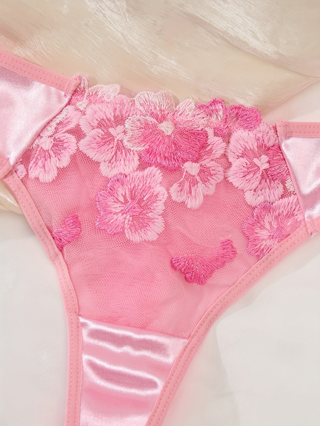 Chic pink floral lingerie set for women, featuring a comfortable push-up bra and low-rise briefs - ideal for casual wear.