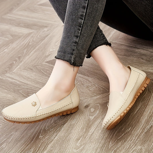 Stylish, comfortable women's loafers with flower buckle detail and soft sole for daily wear.