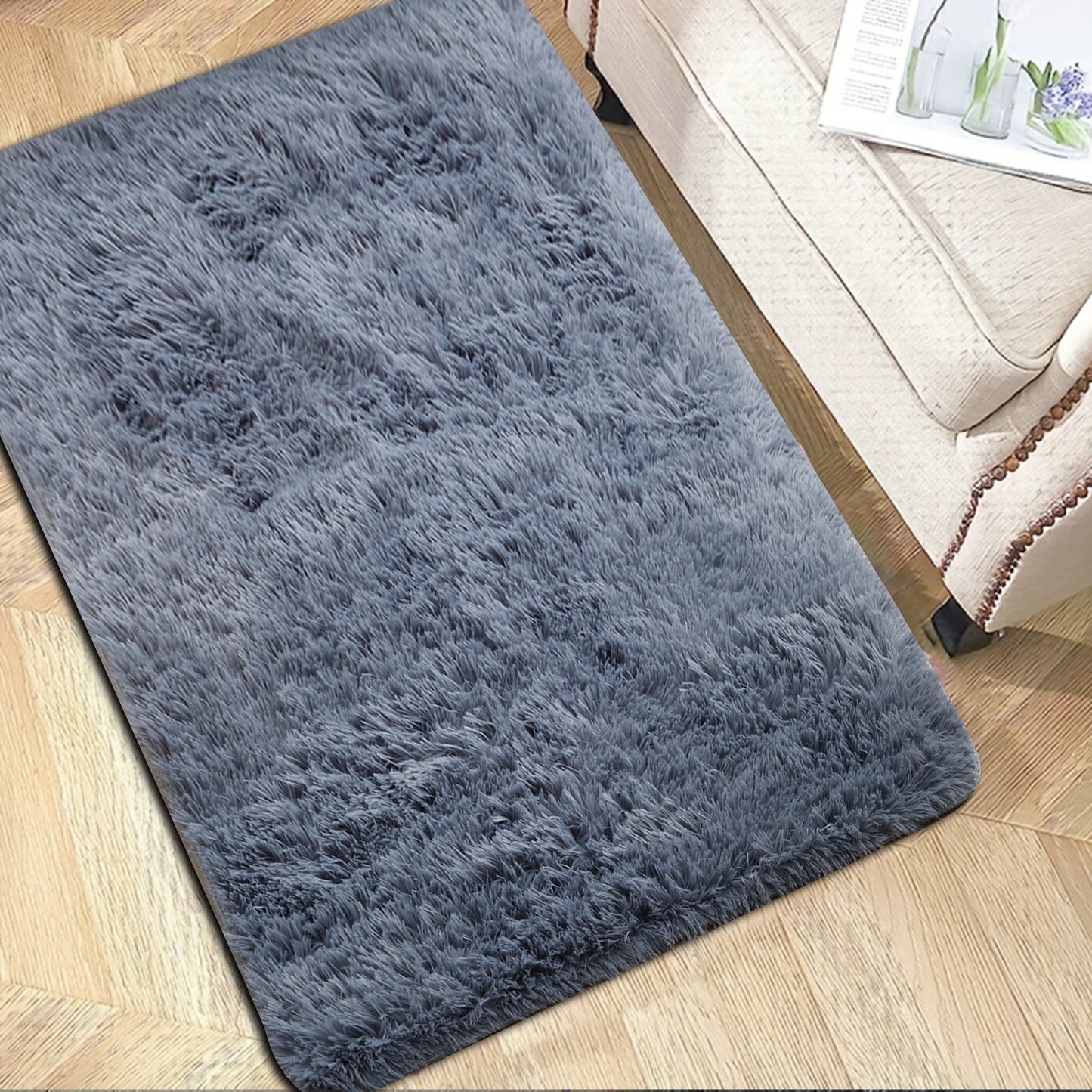 Soft area rug with tie-dye design, perfect for your bedroom or living room. This washable patio mat is ultra fuzzy and adds a decorative touch to any space. It is also suitable for use as a bedside accessory, in a cloakroom, or on a coffee table.