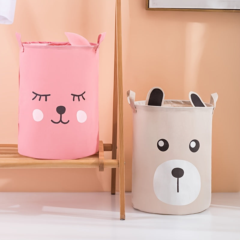 Waterproof fabric toy storage bin with cute cartoon design for kids' toys organization.