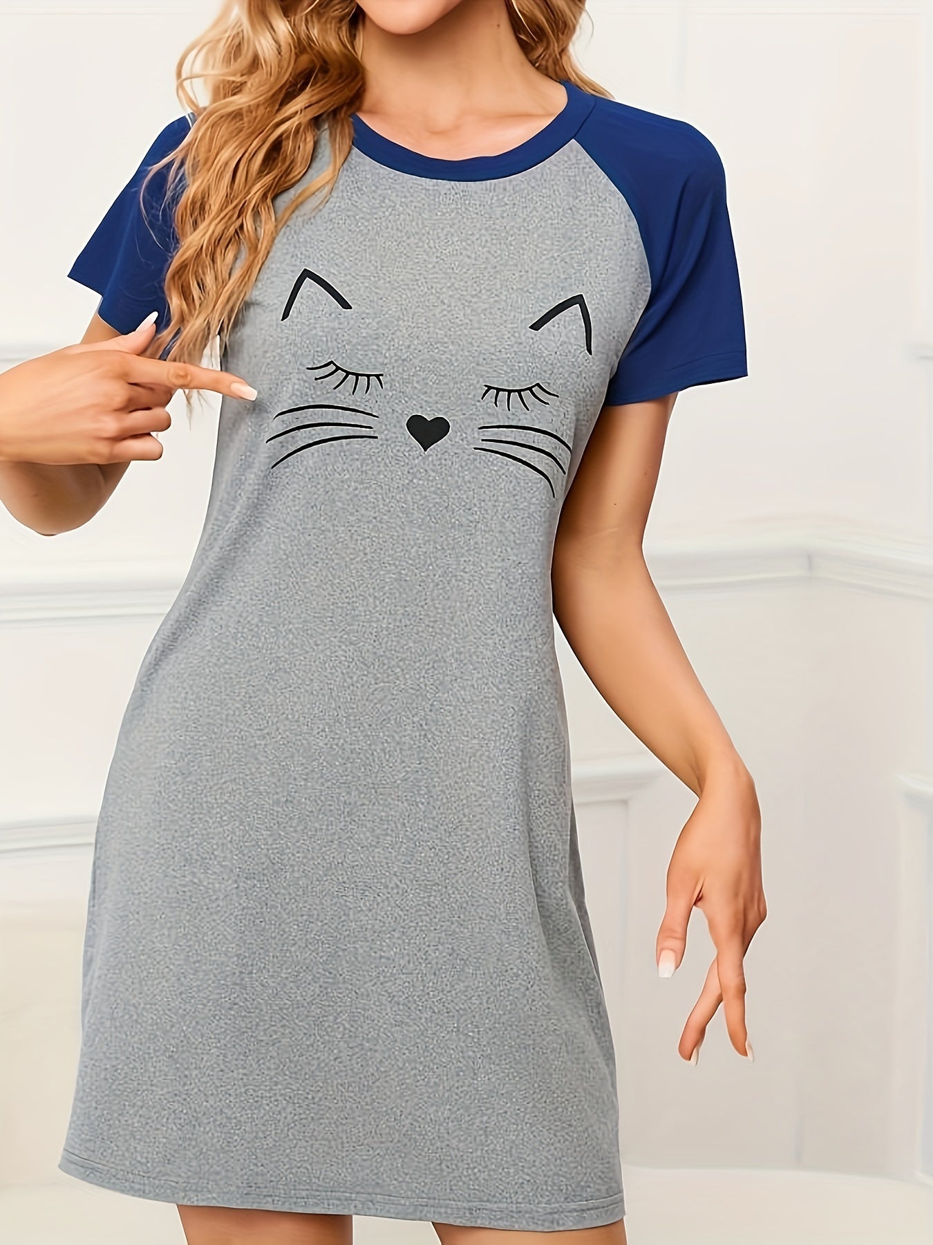 Casual women's dress with playful cat print and color block design, made of soft, machine washable polyester blend - suitable for all seasons.