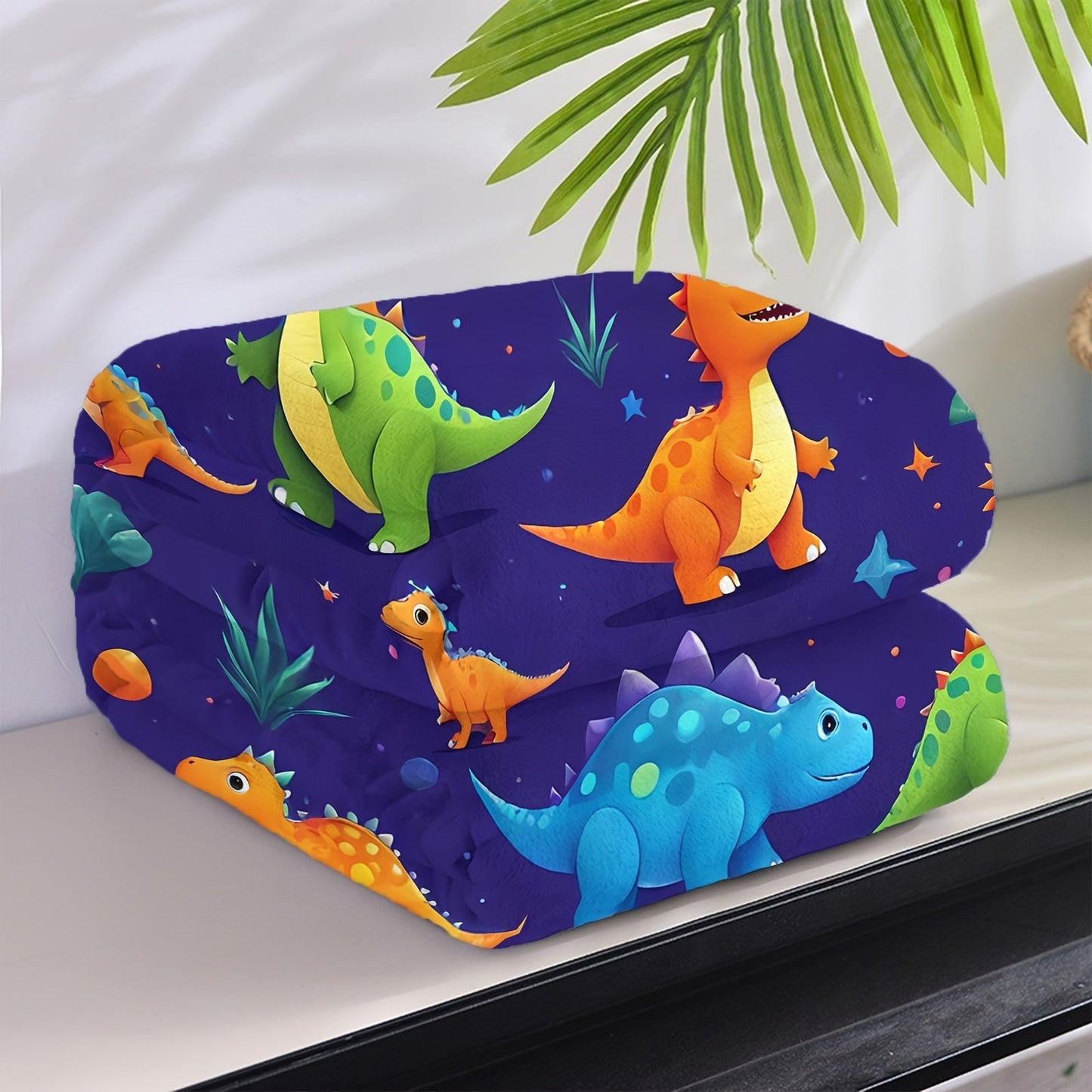 Stay warm and cozy year-round with our Dinosaur Paradise Fleece Blanket - perfect for all seasons!