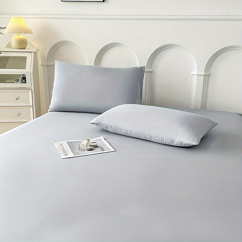 Single piece solid color fitted sheet with brushed finish, anti-slip design, and dustproof feature, ideal for Simmons mattresses.