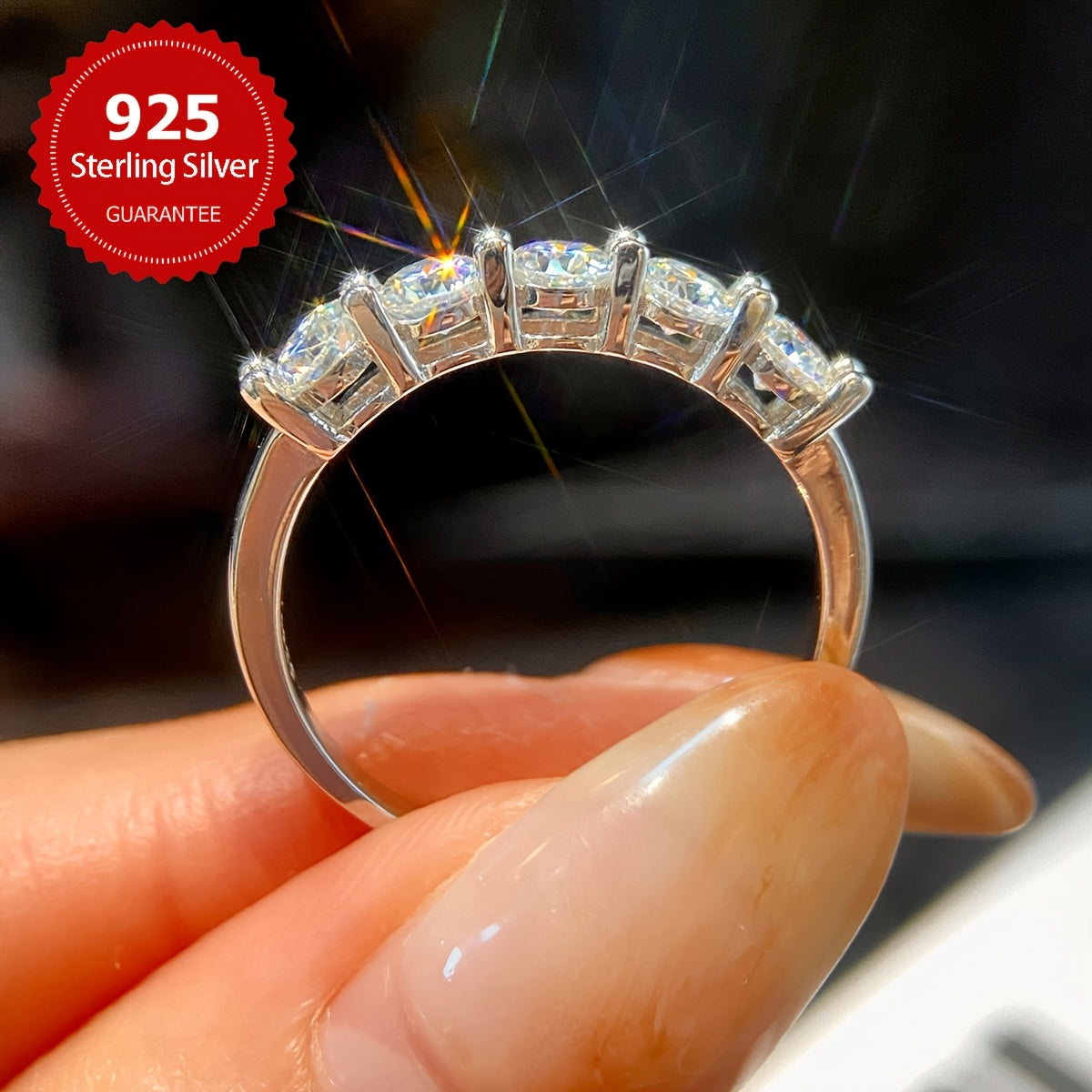 A stunning engagement ring with 7 pieces of 0.3 carat Moissanite set in S925 pure silver. This hypoallergenic ring is perfect as a promise ring or eternal ring, ideal for anniversaries and Valentine's Day. It makes a luxurious gift for women, with