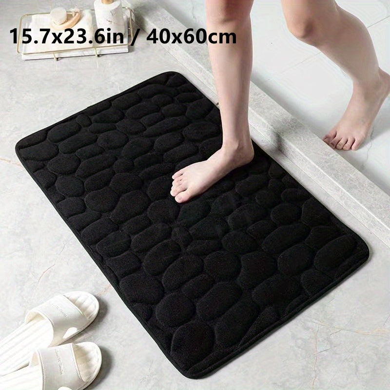 Cobblestone Embossed Bathroom Bath Mat - The Perfect Addition to Your Shower Room! This machine washable bath rug is designed for rapid water absorption, with a non-slip backing for added safety. Keep your bathroom floors dry and comfortable with this