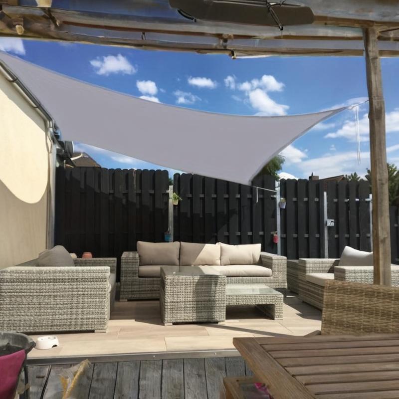 Waterproof rectangular sunshade sail for patio and garden made of durable polyester blend.