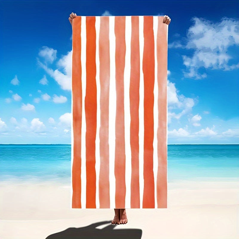 Oversized striped beach towel perfect for adventures. Made of super soft microfiber, quick-dry, sand-free, and ideal for various activities. Available in tropical blue & white. Comes in two sizes and is lightweight and absorbent.