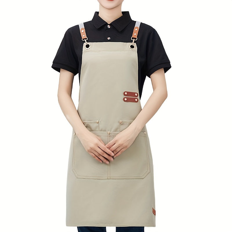 Stay stylish and protected with this chic waterproof canvas apron. Perfect for coffee bars, restaurants, and flower shops, this apron features pockets for convenience. Available in beige, black, or brown with golden-toned buckles, this waist overall is