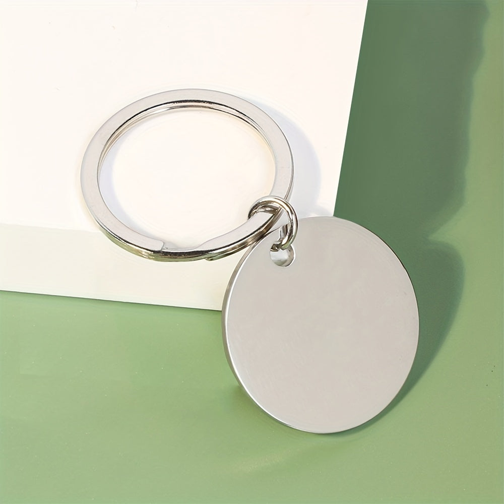 This listing is for a pack of 10 laser-engraved keychains made from double-sided glossy stainless steel in various shapes including round and heart. These keychains are designed to hang securely with a dog's name and other information engraved on the