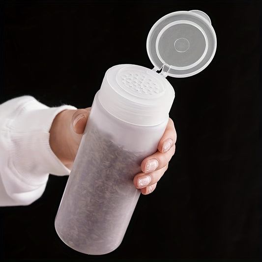 Multi-purpose powder dispenser bottle for various ingredients such as flour, sugar, coffee, BBQ spices, etc. Made of BPA-free plastic, easy to clean, available in 400ml or 600ml sizes, a must-have kitchen gadget.