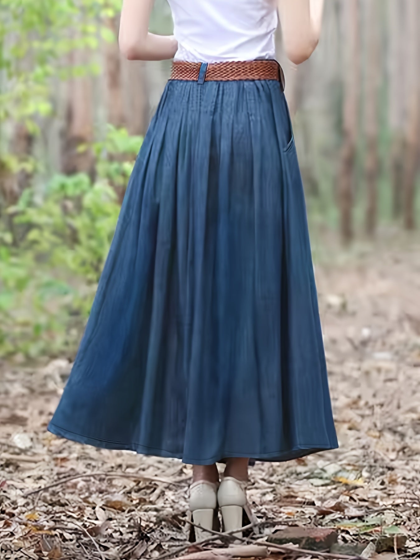 Plus size denim midi skirt with decorative button pockets, casual bohemian style in dark blue. Non-stretch, machine washable with faux button detail. Perfect for spring/summer/fall.