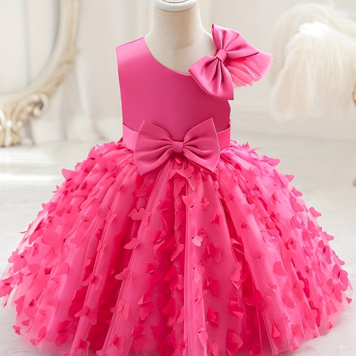 Toddler girls princess dress with butterfly design, bow belt, and flutter mesh sleeves, perfect for parties and birthdays.