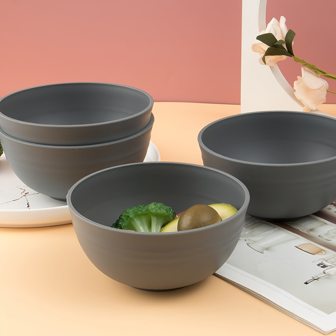 Durable plastic bowls safe for microwave use, perfect for meals at home or on-the-go. Offered in sets of 2, 4, or 6.