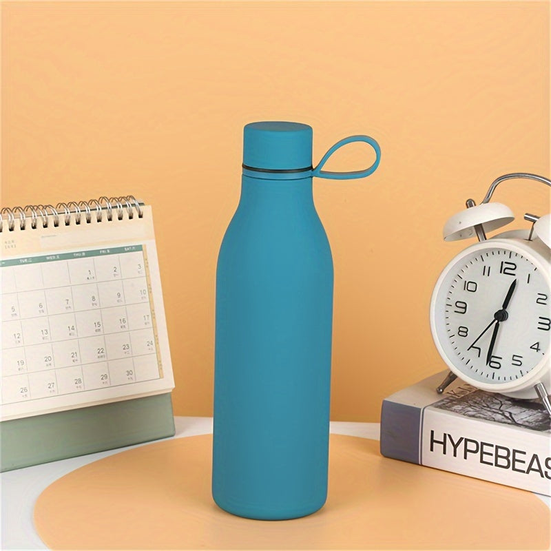 Stainless steel vacuum insulated water bottle with carrying handle, leak-proof design, and 500ml capacity, perfect for outdoor activities and gifts.