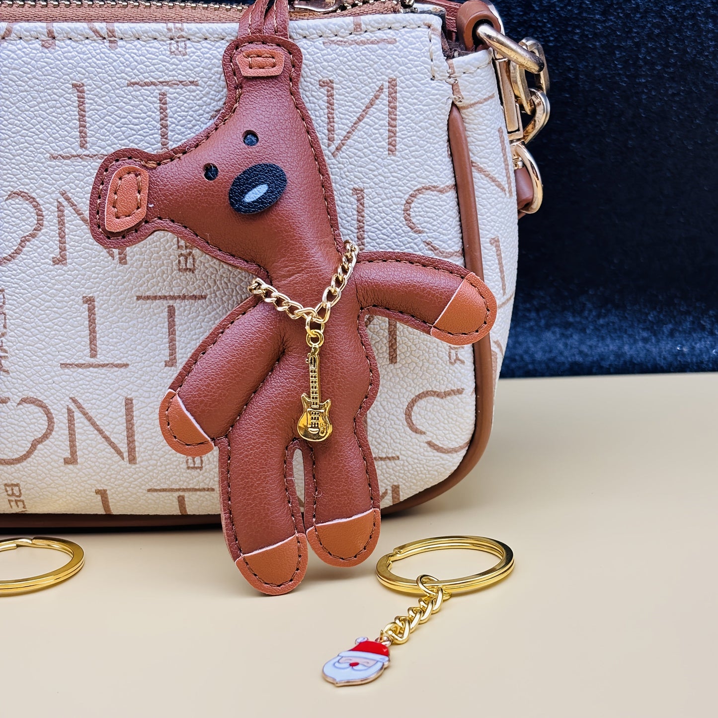 Fashdiy's exclusive high-quality custom faux leather tilted head music bear keychain is a versatile accessory, perfect for attaching to bags, phones, or cars. This unique accessory makes for an ideal gift for Christmas, Valentine's Day, or any party