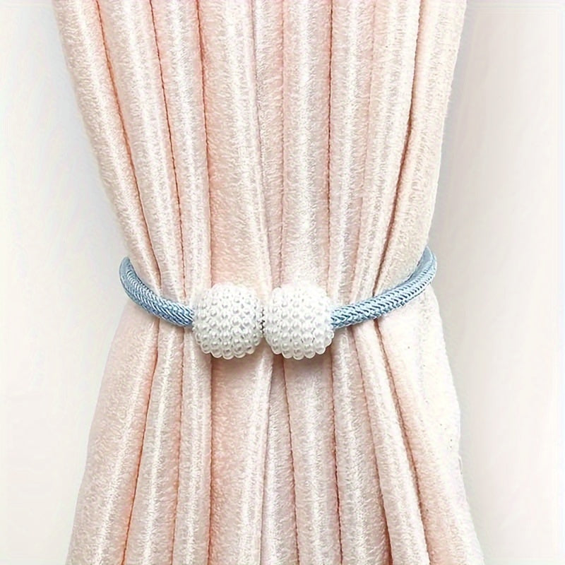 Upgrade your home decor with these sophisticated Magnetic Curtain Tiebacks featuring luxurious Faux Pearl Accents. Add a touch of European elegance to your space with these stylish weave clips and rope straps designed for large drapes.