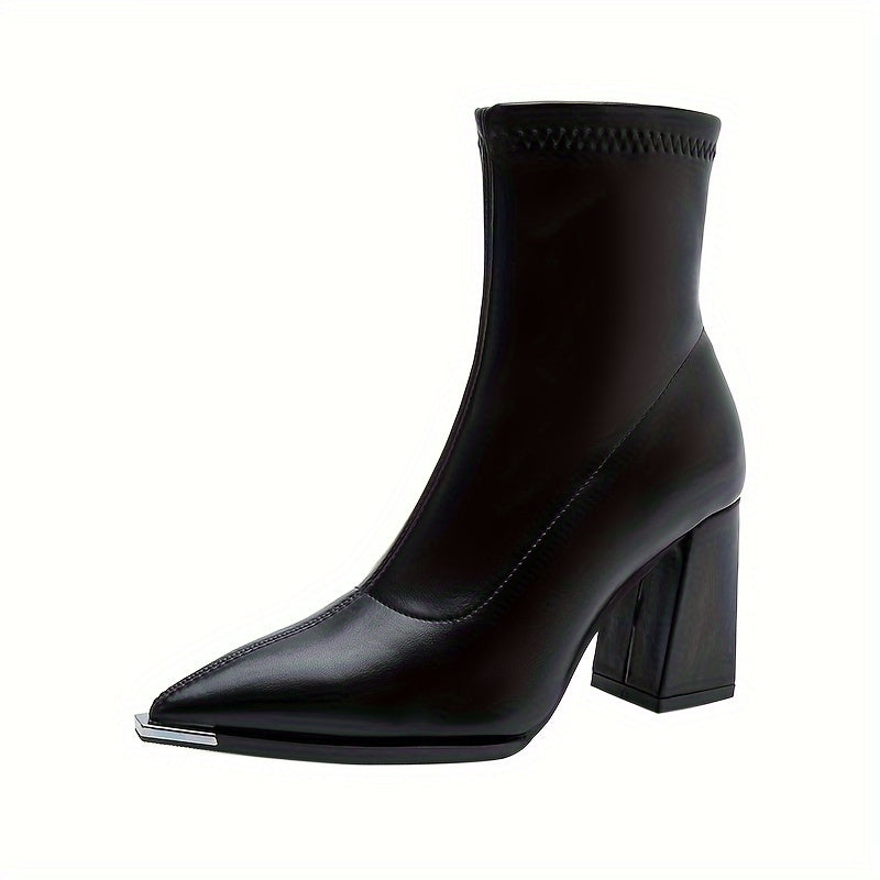 Stylish ankle boots with pointed toe, chunky heel, faux cover, and side zipper closure for all seasons.