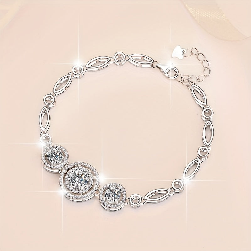 This new 925 Sterling Silver Moissanite Bracelet features a stunning 2 Carat Round Bag design, exuding a fresh and versatile temperament. It is the perfect piece of jewelry for women, making it an ideal anniversary gift. This bracelet is suitable for