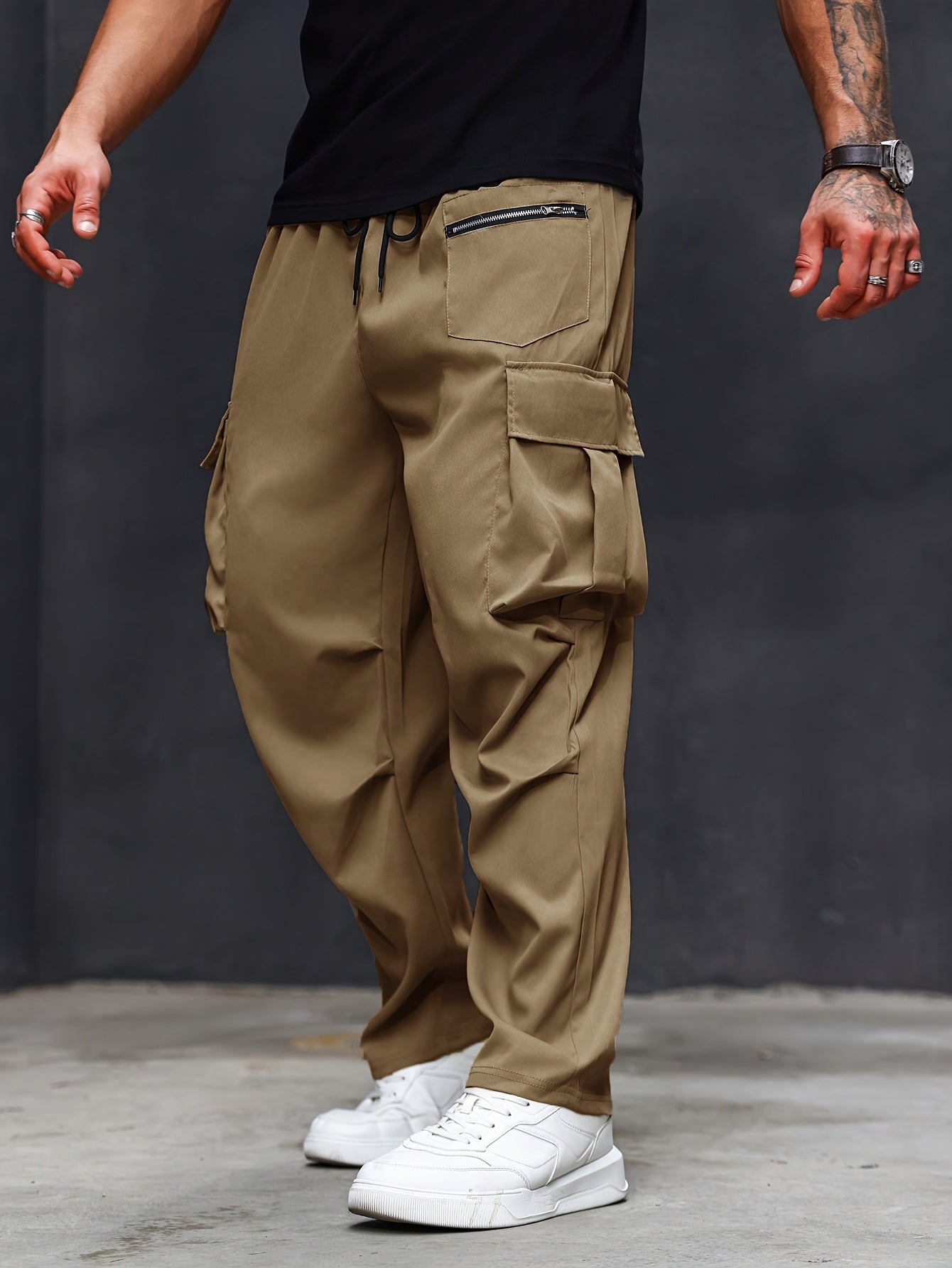 Plus size men's cargo pants with athletic and casual style, regular fit and pockets.