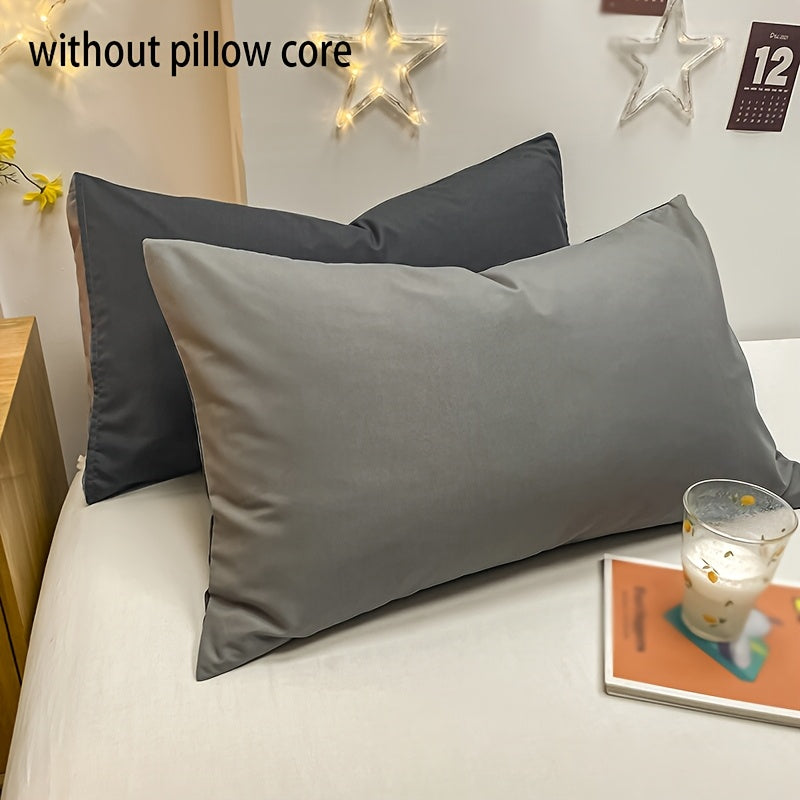 Basic set of 2 rectangular pillowcases made of 90g solid color fleece material, featuring an envelope closure design. These pillowcases are ultra soft, breathable, and machine washable, suitable for use in bedrooms, guest rooms, hotels, and more. The