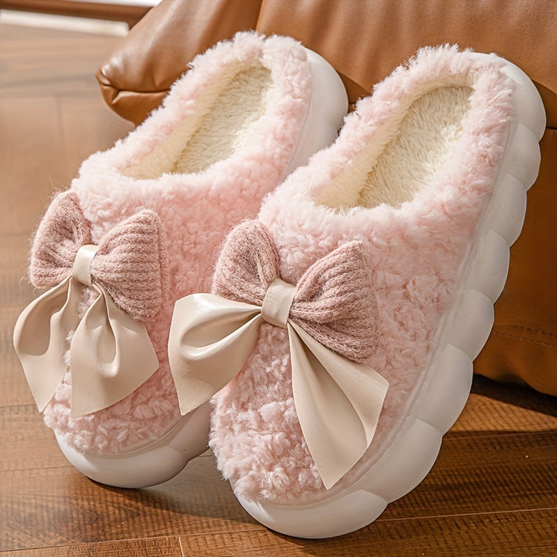 Women's winter warm plush slippers with bowknot detail and non-slip sole, perfect for autumn/winter indoor wear.