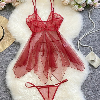 Stylish sheer slip dress with lace detail - ruffle-trimmed sleepwear set for women with matching thong, made from breathable polyester blend.