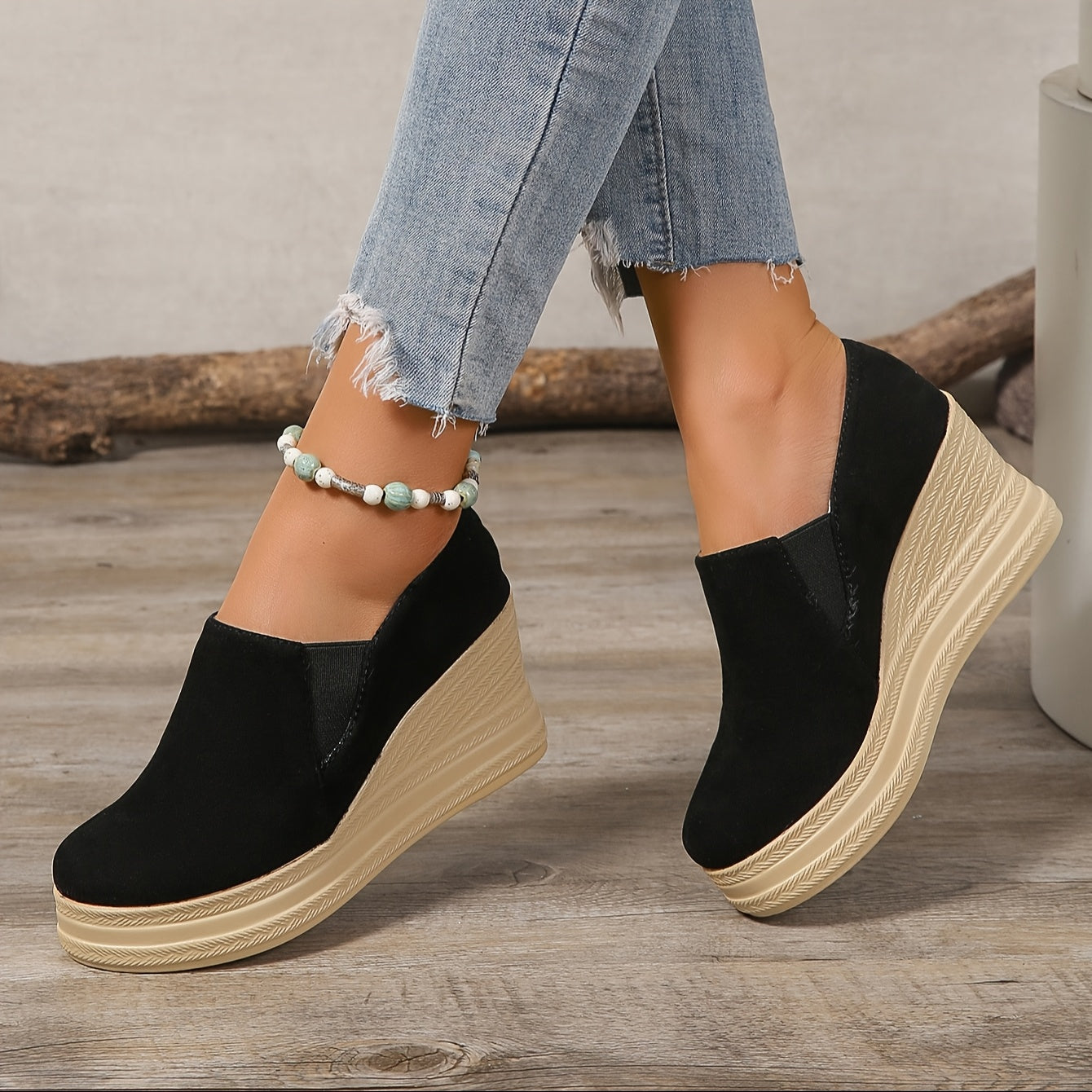 Women's platform wedge sneakers with high heels and slip-on design, featuring faux sole and fabric insole for all-season comfort.