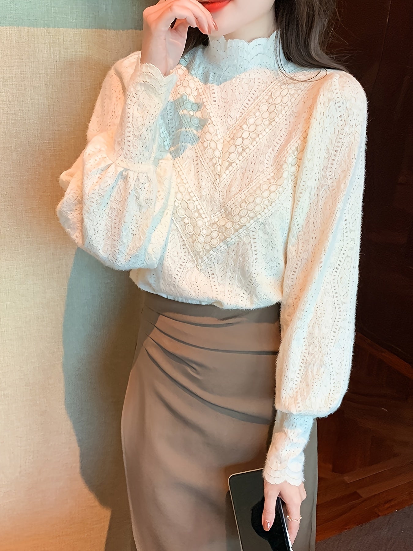 French Court-inspired lace blouse with mock turtleneck, made of nylon and spandex. Machine washable, ideal for spring/fall.