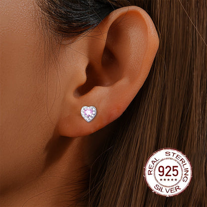 These stylish and versatile earrings are crafted from S925 sterling silver and feature sparkling zirconia in a heart-shaped design. Perfect for daily wear, gifting, or vacation, they have a silvery weight of 0.7-0.5g.