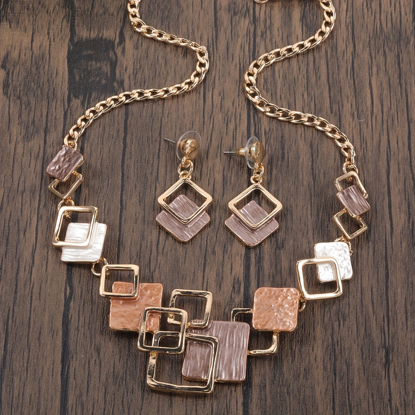 One trendy geometric design jewelry set includes one pair of earrings and one necklace in boho style, perfect to match with daily outfits or as a party accessory. Made from enamel, this set is a must-have addition to your jewelry collection.