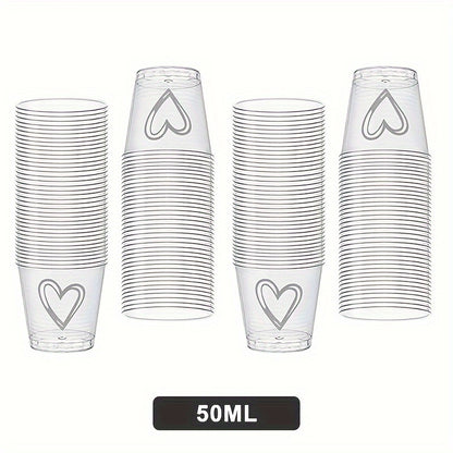 50 or 100 elegant heart-shaped disposable plastic cups with lids, ideal for weddings and parties. Recyclable, lead-free, and shatterproof, perfect for serving coffee, desserts, and more.